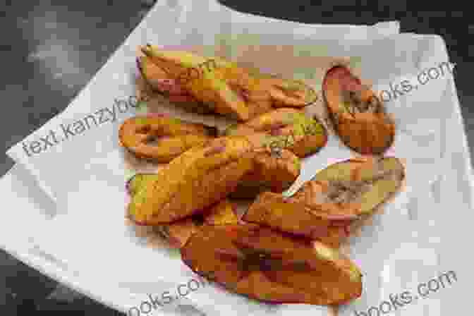 Plantain Fritters, Crispy And Golden Brown, Made From Ripe Plantains And Seasoned With A Hint Of Cinnamon And Nutmeg The African Vegan In Today S Modern World : Guide To African Vegan